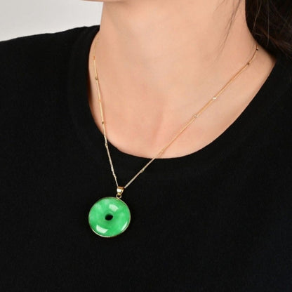 Carved Natural Green Jade Doughnut Pendant